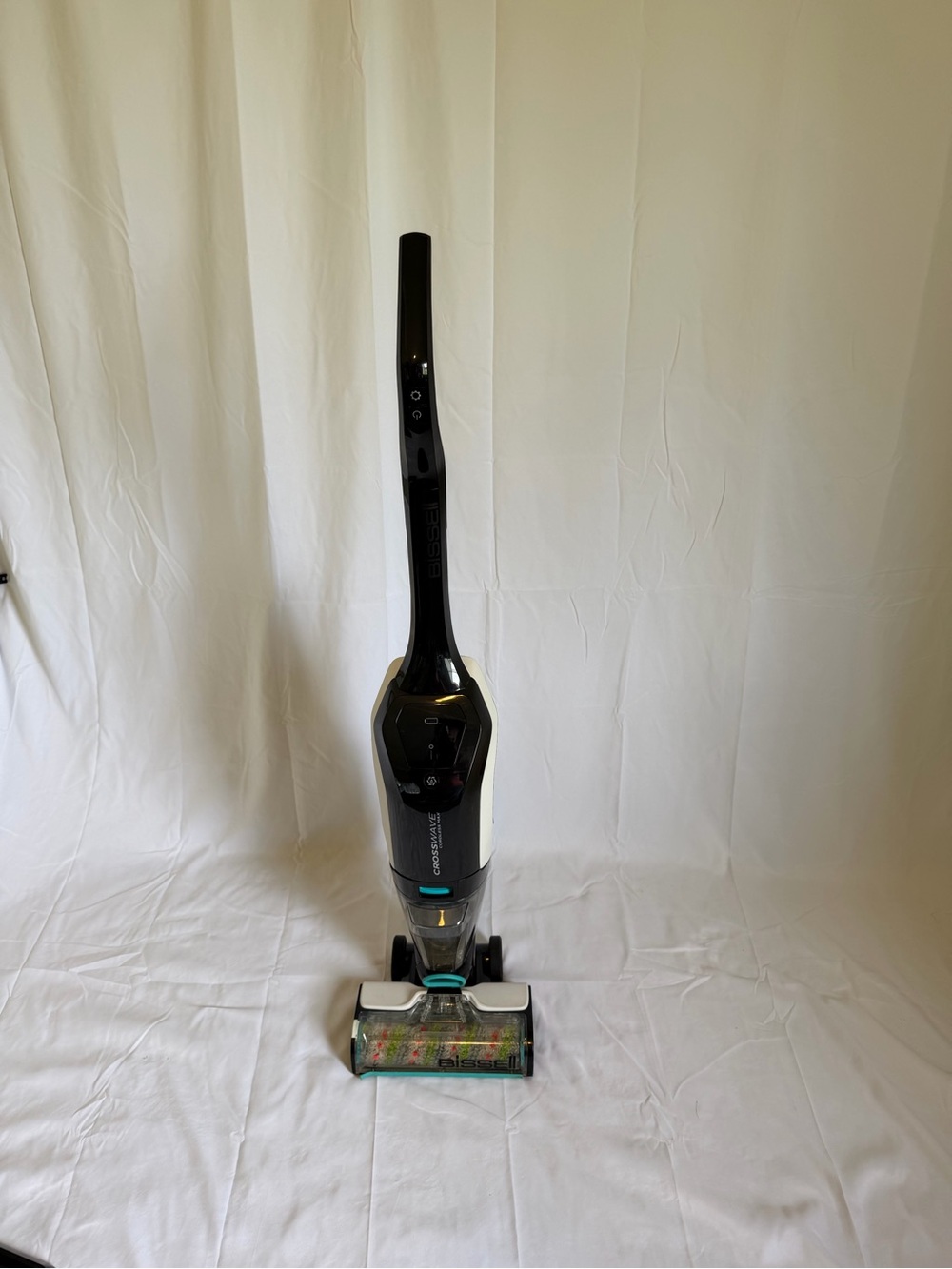 Bissell Stick Vacuum in Black with Teal Accents